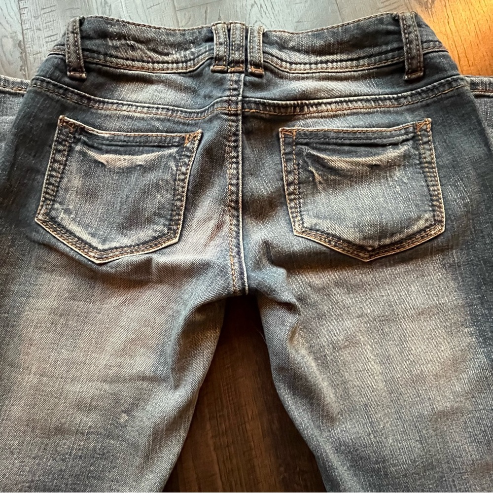Skinny leg blue jeans size 1 size 25 mid low rise